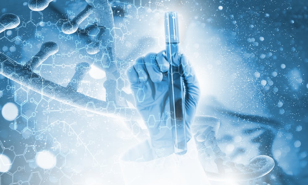 Close up image of human hand holding test tube. Science concept Close up image of human hand holding test tube. Science concept